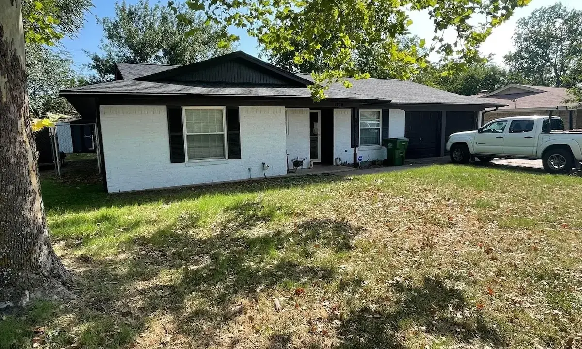 Professional roofing crew working on a residential roof in Gloucester Point